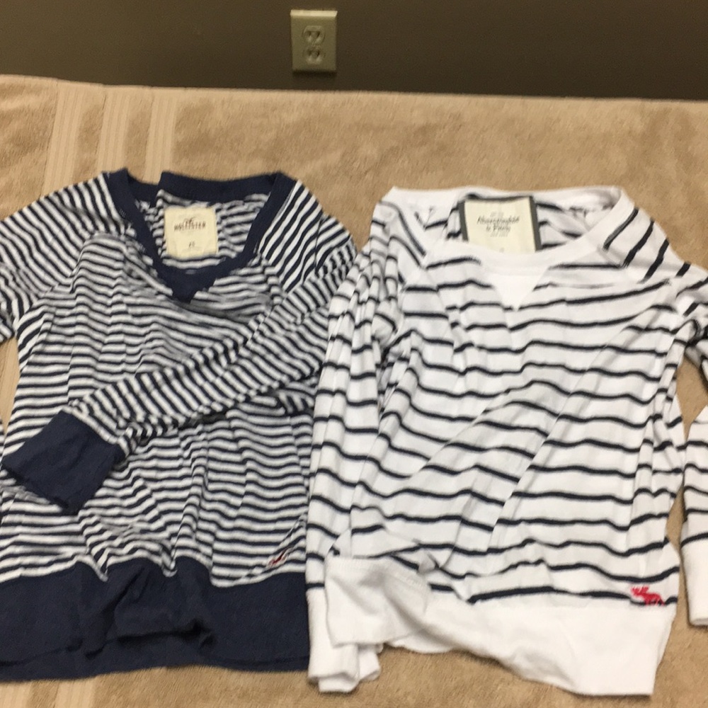 2 shirts 1 is Abercrombie 1 is holister